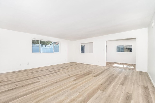 empty room with light wood-type flooring