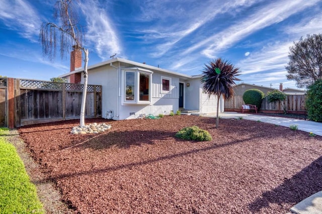 view of front of home featuring a patio