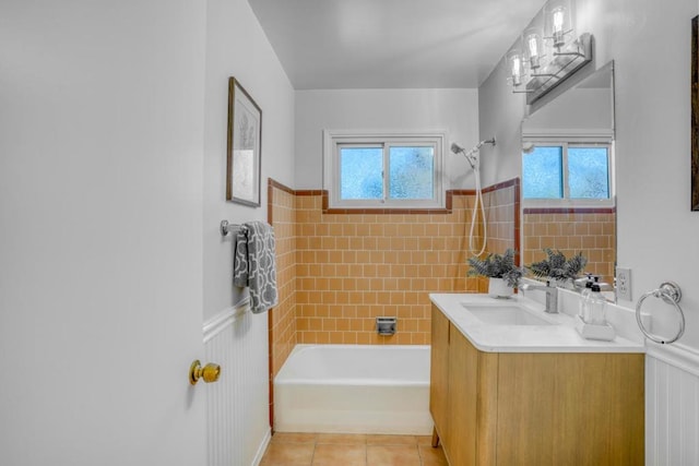 bathroom with shower / bathing tub combination, vanity, and tile patterned flooring