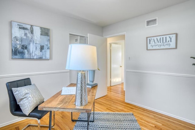 office featuring hardwood / wood-style floors