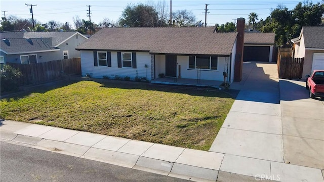 ranch-style house featuring a front lawn