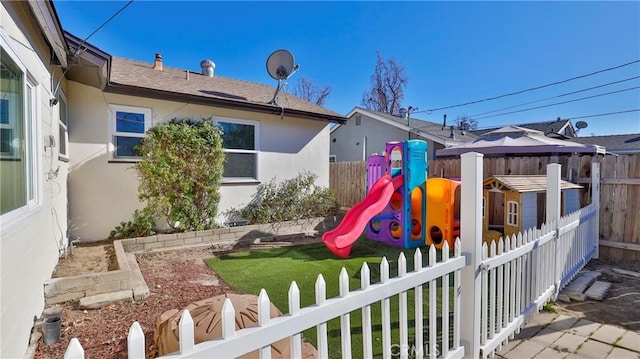 view of playground featuring a yard