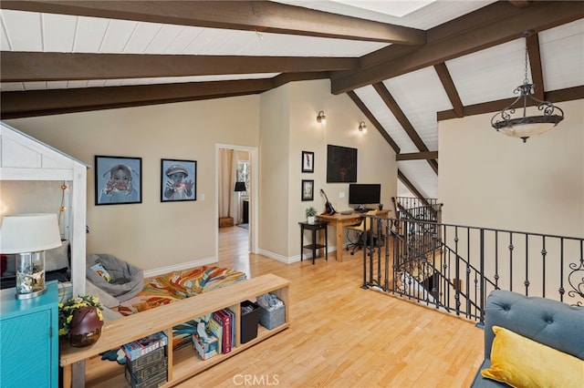 interior space featuring lofted ceiling with beams and wood-type flooring