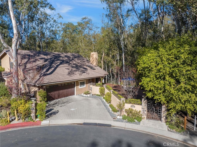 view of front of property with a garage