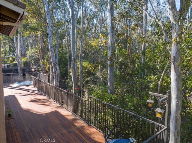 deck featuring a pool