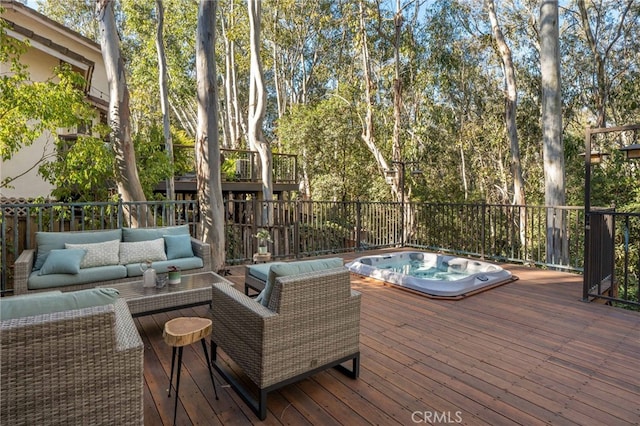 wooden deck featuring outdoor lounge area