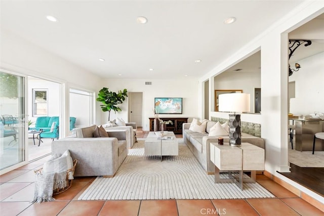 living room with light tile patterned floors