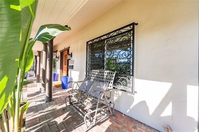 view of patio featuring a porch