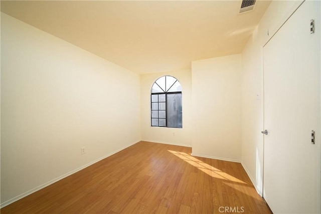 empty room with light wood-type flooring