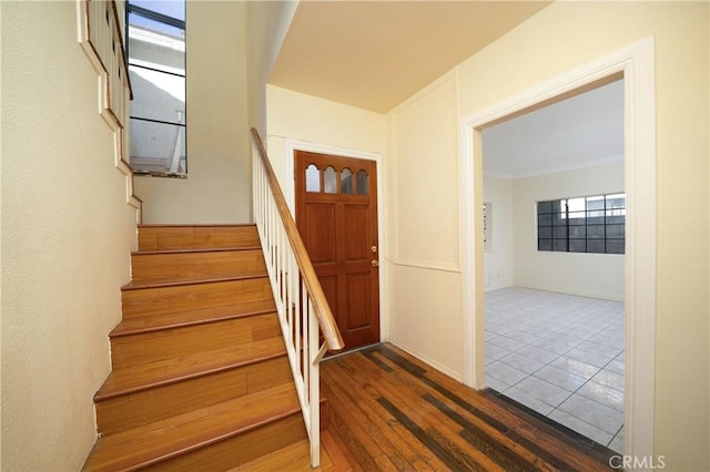 foyer featuring dark hardwood / wood-style floors