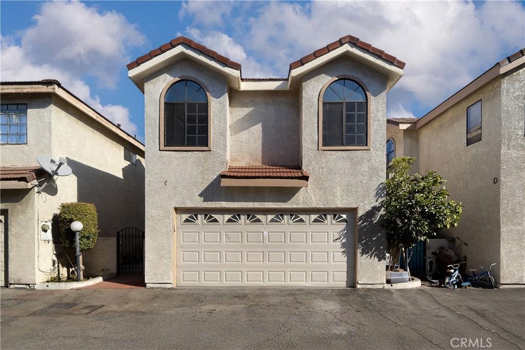 mediterranean / spanish-style home featuring a garage