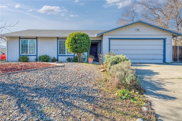 single story home featuring a garage