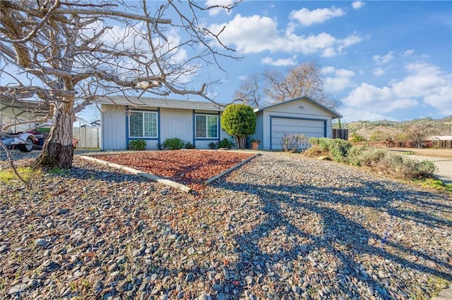 single story home featuring a garage