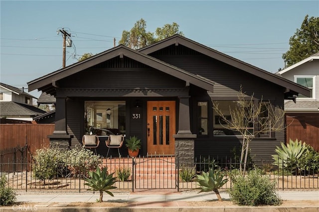 bungalow-style house featuring covered porch