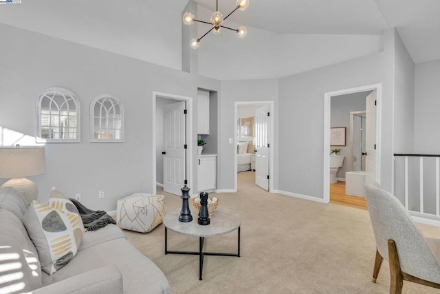 carpeted living room featuring lofted ceiling and a chandelier