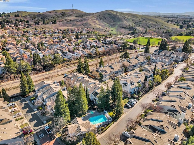 drone / aerial view featuring a mountain view