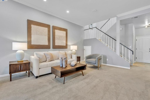 living room with light colored carpet and crown molding