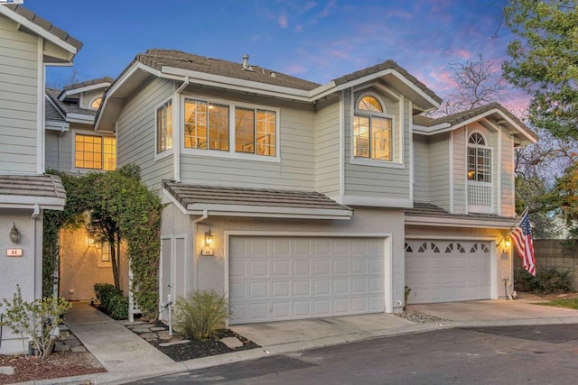 view of front of property featuring a garage