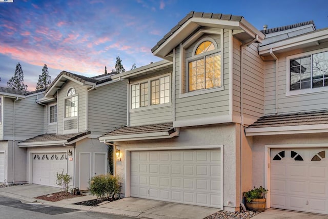 front of property featuring a garage