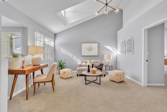 sitting room with lofted ceiling, a chandelier, and light colored carpet