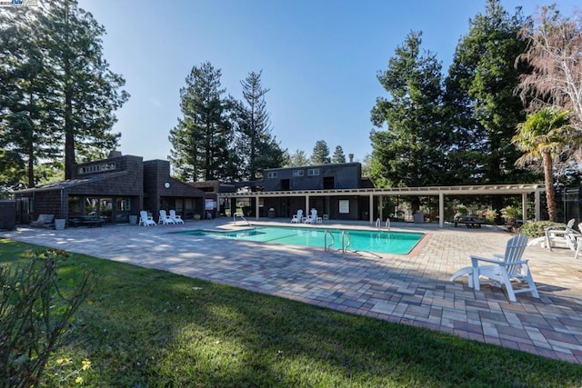 view of pool featuring a patio