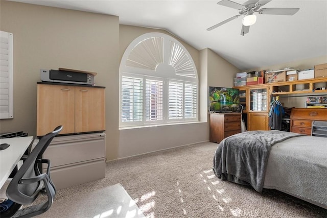 bedroom with lofted ceiling, carpet floors, and ceiling fan