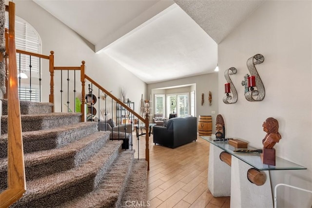 interior space featuring vaulted ceiling