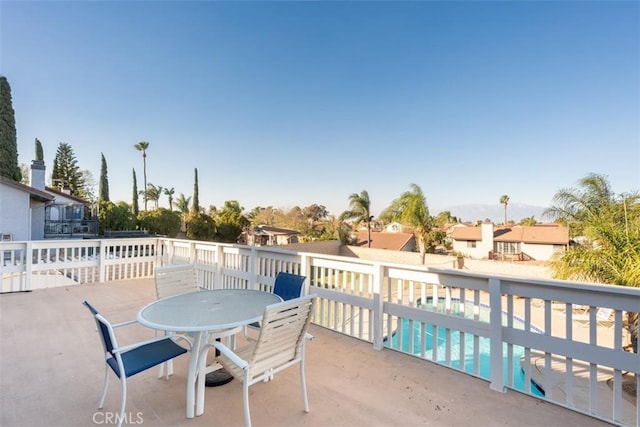 view of patio with a fenced in pool