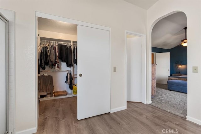 bedroom featuring a closet and light hardwood / wood-style flooring