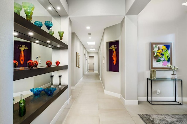 hallway with light tile patterned flooring