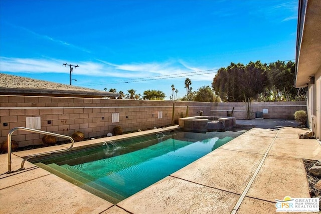 view of pool featuring an in ground hot tub