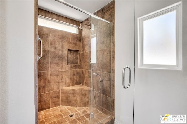 bathroom with an enclosed shower