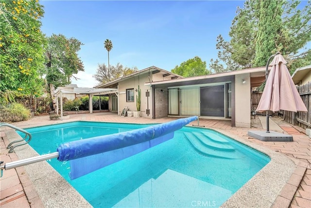 view of pool featuring a patio