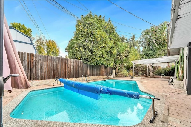 view of swimming pool featuring a patio