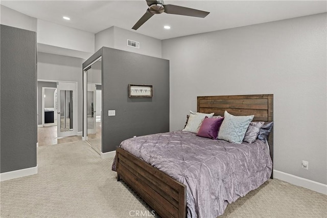 carpeted bedroom with ceiling fan