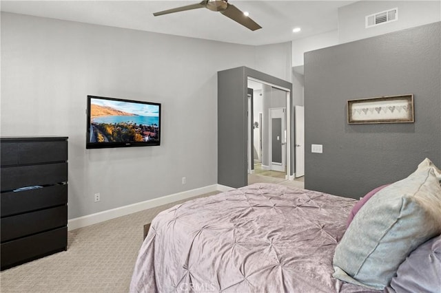 bedroom with light carpet and ceiling fan