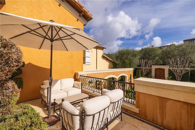 balcony with an outdoor hangout area