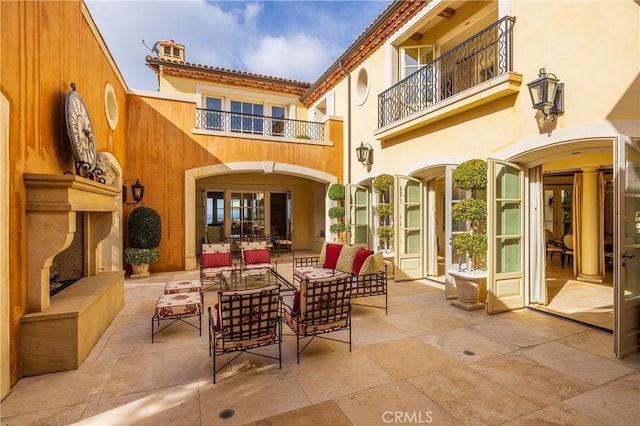 view of patio / terrace featuring a balcony and an outdoor hangout area