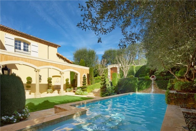 view of pool with a patio area