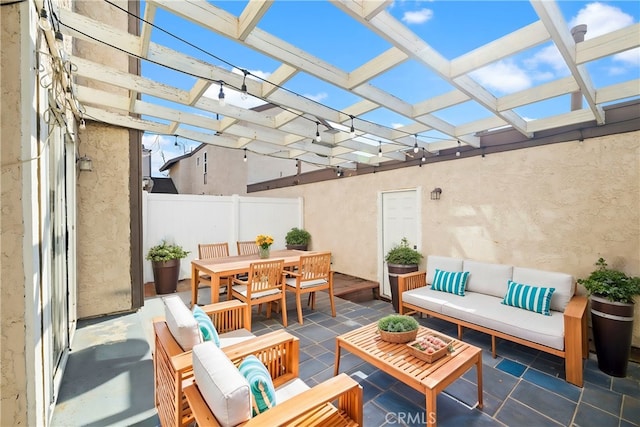 view of patio featuring outdoor lounge area and a pergola