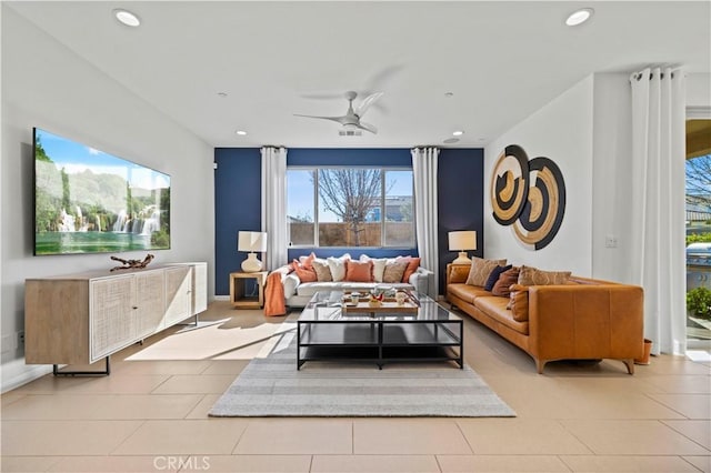 tiled living room featuring ceiling fan