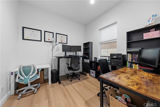 office space featuring light hardwood / wood-style floors