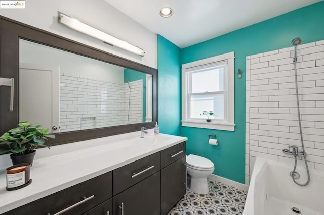 full bathroom with toilet, tiled shower / bath combo, tile patterned floors, and vanity