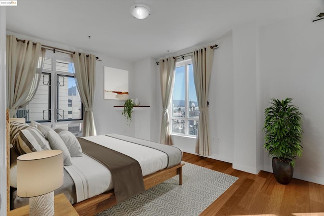 bedroom featuring hardwood / wood-style floors