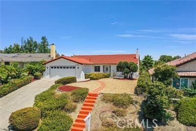 single story home with a garage