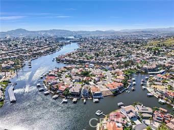 bird's eye view with a water and mountain view