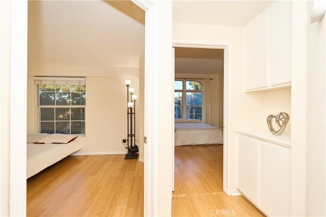 hallway featuring light hardwood / wood-style flooring