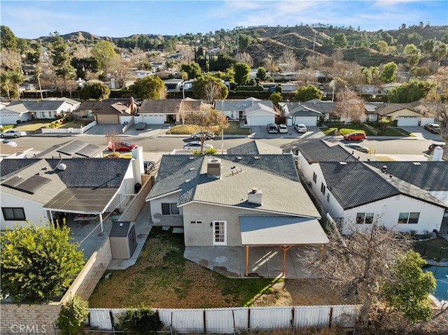 drone / aerial view featuring a mountain view