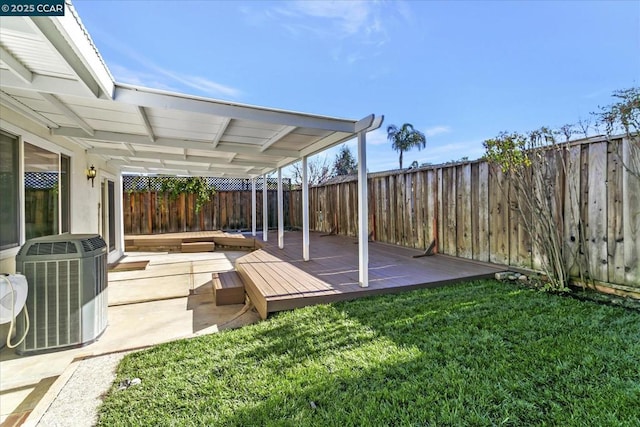 view of yard with a patio area and central AC