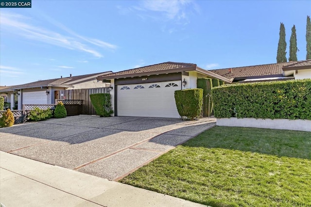 single story home with a front lawn and a garage